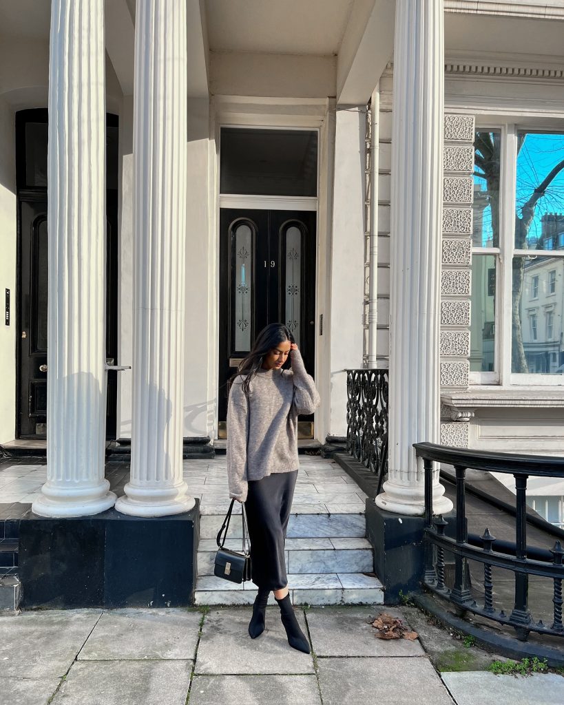 Grey Oversized Sweater + Black Satin Midi Skirt + Black Pointed Boots