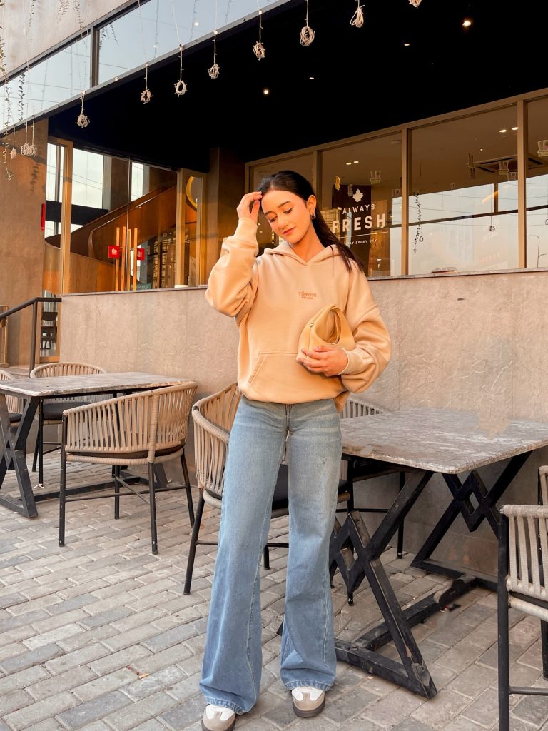 Tan Hoodie + Light Wash Jeans + Two-Tone Sneakers
