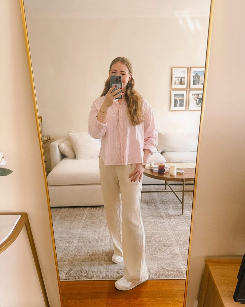 Pink Striped Button-Down + Beige Plisse Trousers + White Sneakers
