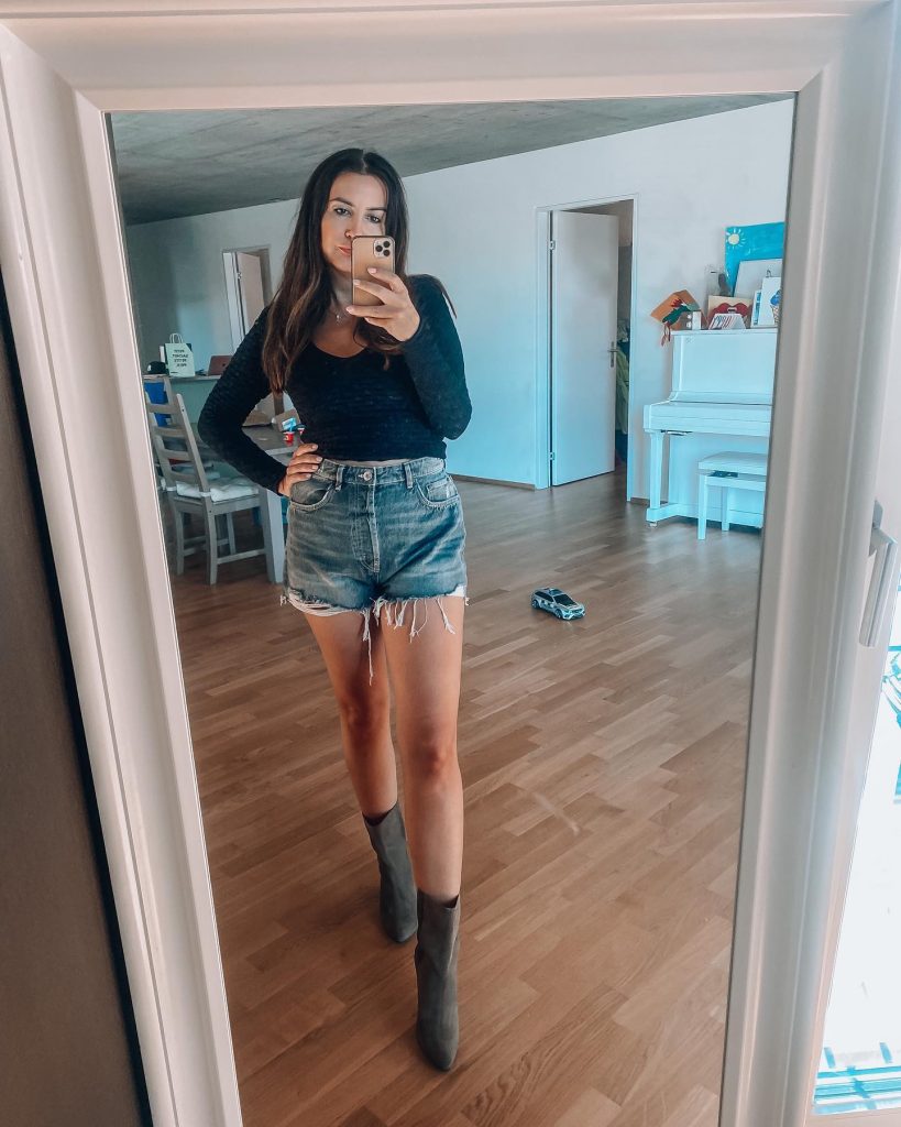 Black Long-Sleeve Crop Top + Denim Cutoffs + Suede Ankle Boots