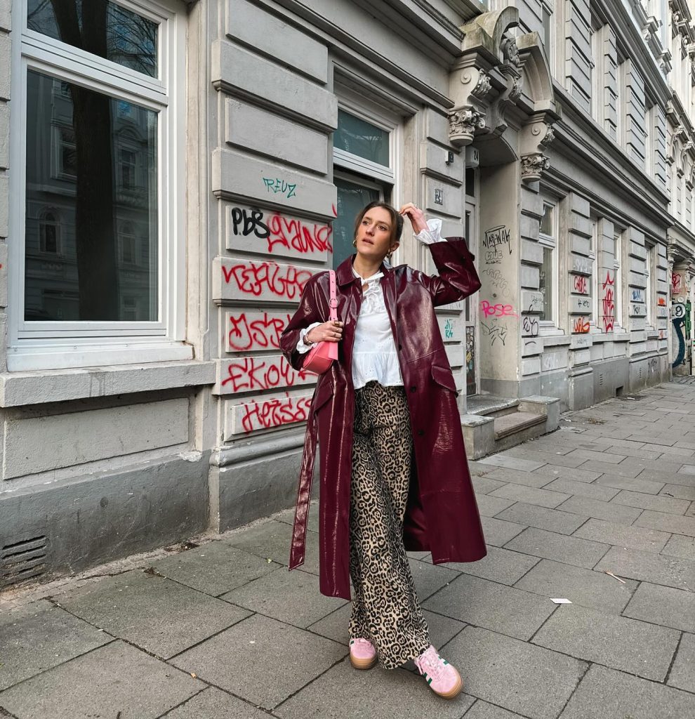 Burgundy Patent Trench Coat + Leopard Print Trousers + Pink Sneakers