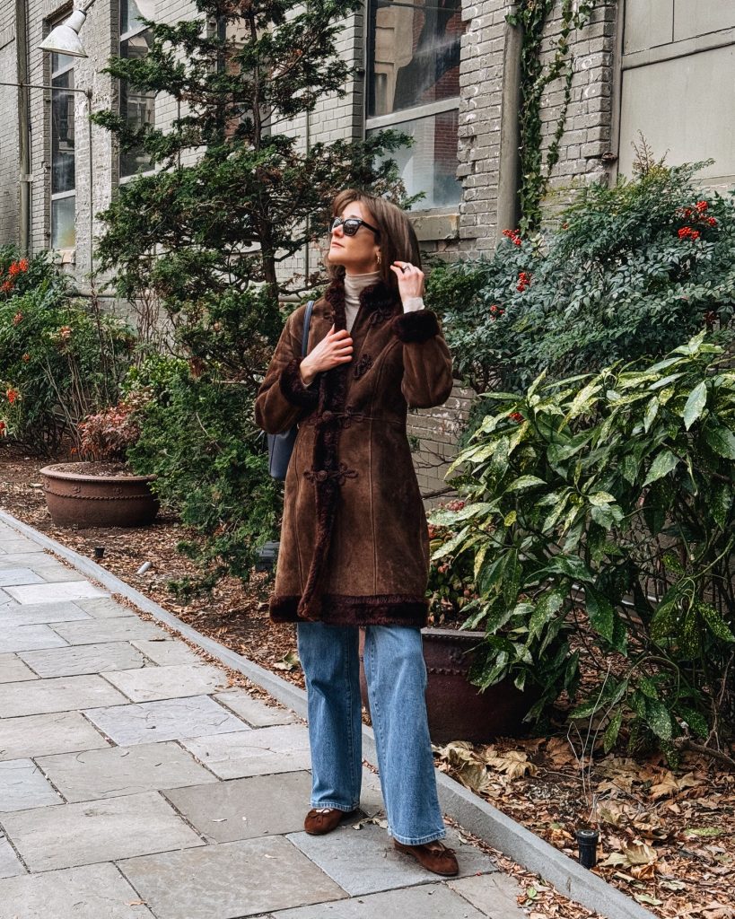 Brown Suede Coat + Light Beige Turtleneck + Blue Wide-Leg Jeans