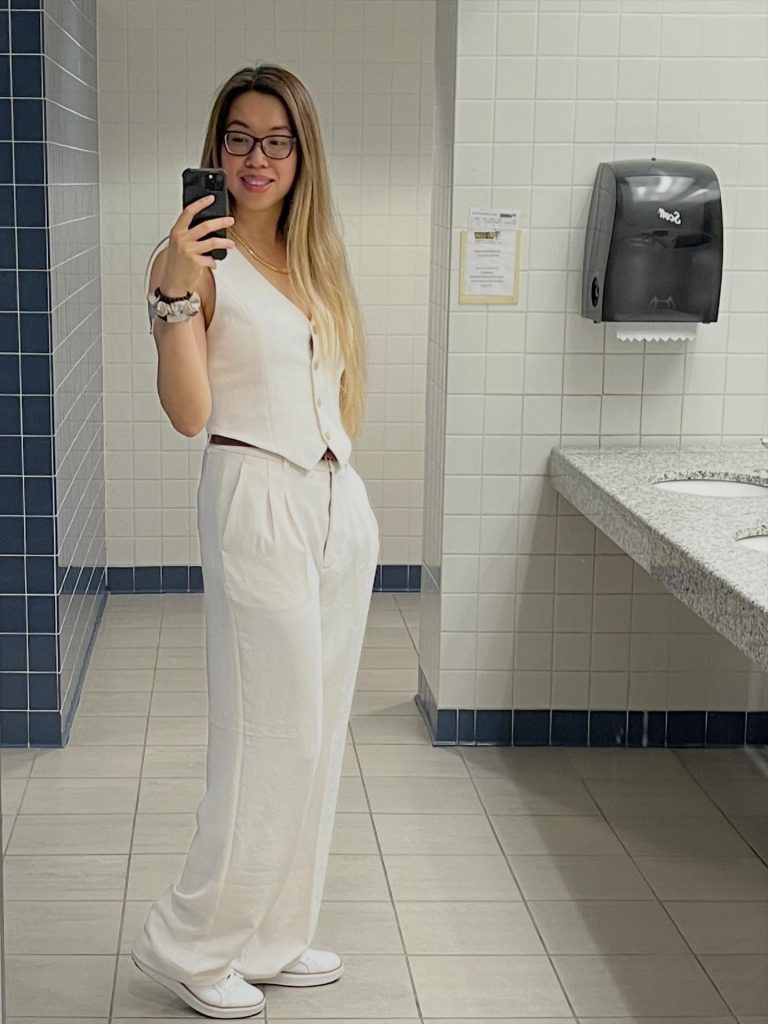 White Tailored Vest + Pleated Wide-Leg Pants + White Sneakers