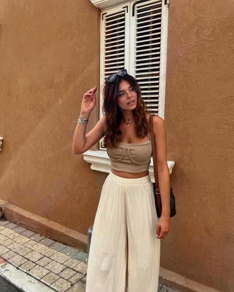 Beige Corset Style Crop Top + Cream Pleated Wide-Leg Pants + Shoulder Bag