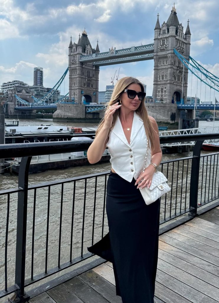 White Waistcoat + Black Maxi Skirt + White Quilted Bag