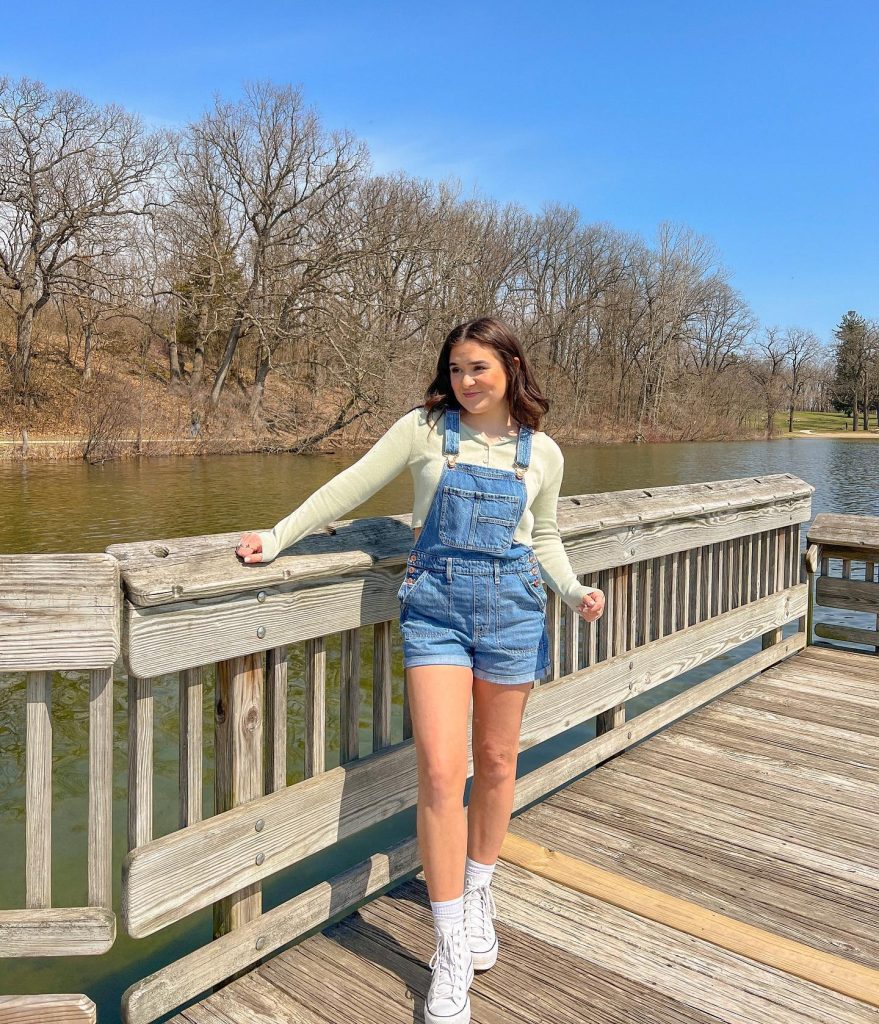 Blue Denim Overalls + Sage Green Long-Sleeve Tee + White High-Top Sneakers