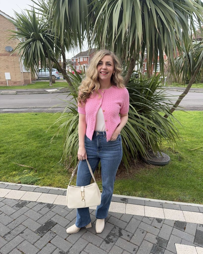 Pink Cable-Knit Cardigan + Blue Flare Jeans + Cream Boots