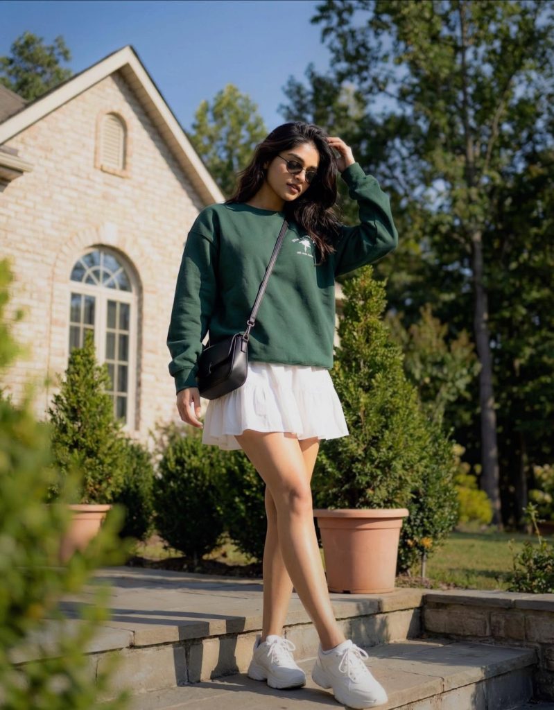 White Ruffled Mini Skirt + Green Graphic Sweatshirt + White Chunky Sneakers