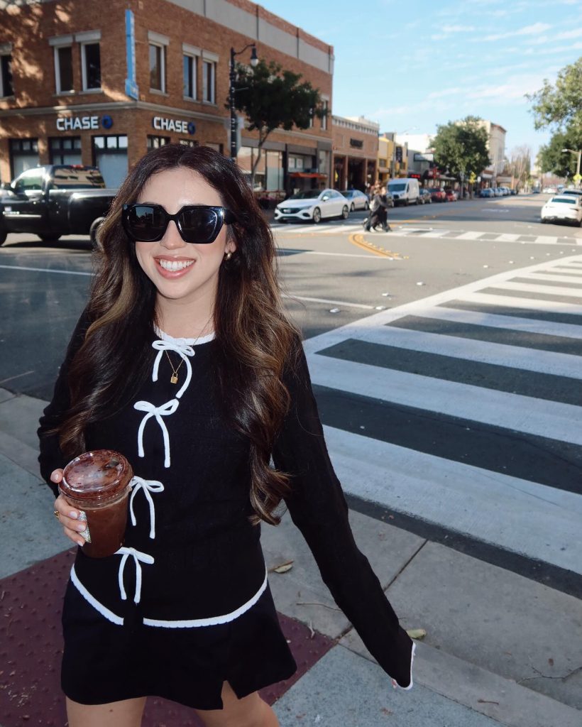 Black Bow-Front Cardigan + Mini Skirt + Tinted Sunglasses
