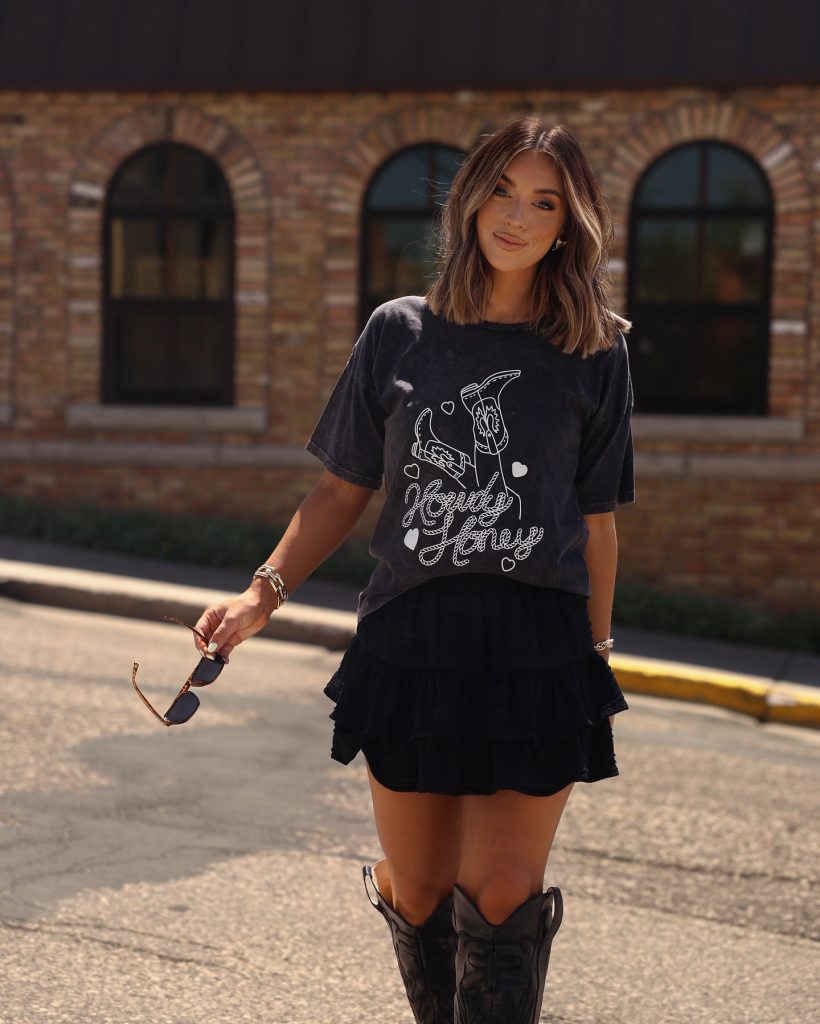 Charcoal Graphic Tee + Black Ruffled Mini Skirt + Cowboy Boots