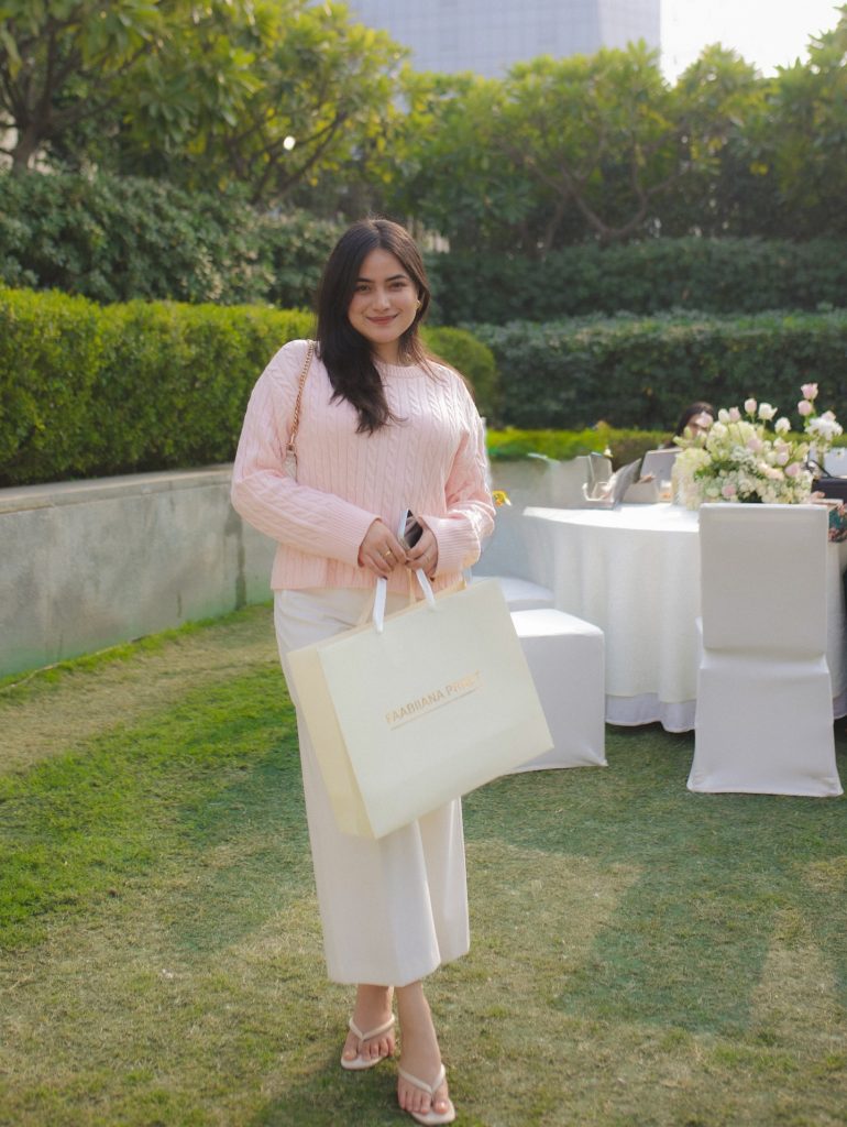 Pink Cable-Knit Sweater + White Straight-Leg Trousers