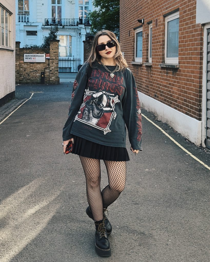 Charcoal Graphic Tee + Pleated Mini Skirt + Fishnet Tights