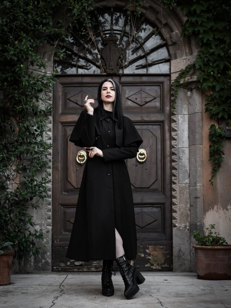 Black Cape Coat + Fishnet Tights + Lace-up Platform Boots