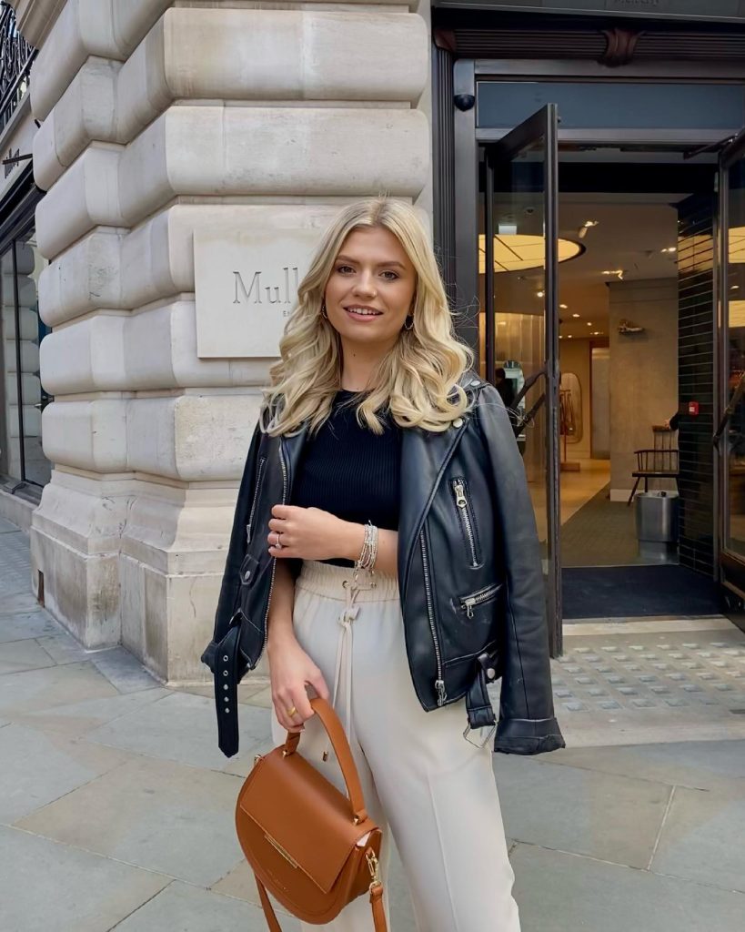 Black Biker Jacket + Ribbed Top + Cream Trousers