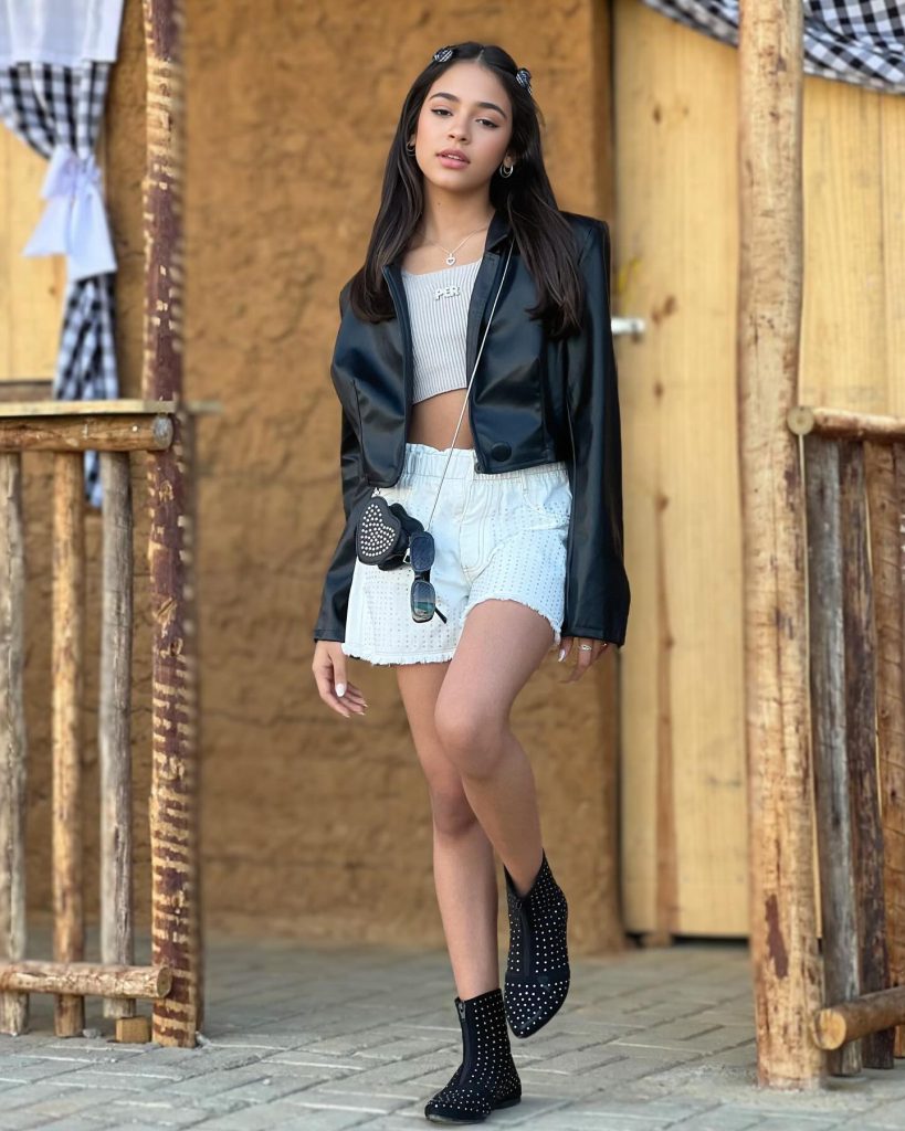 Black Leather Jacket + White Studded Shorts + Black Studded Boots