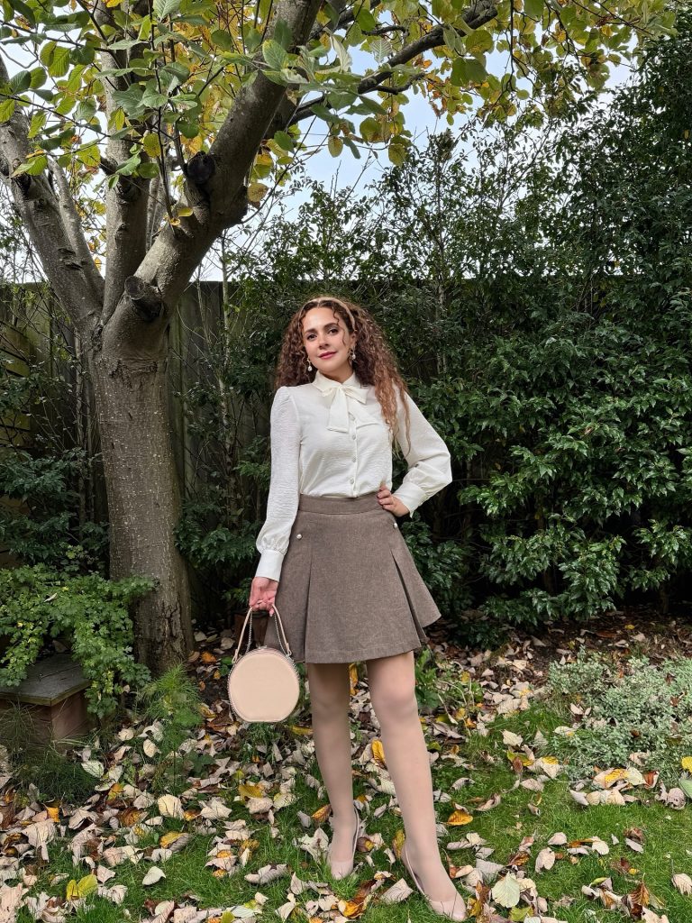 White Bow Blouse + Brown Pleated Skirt + Round Handbag