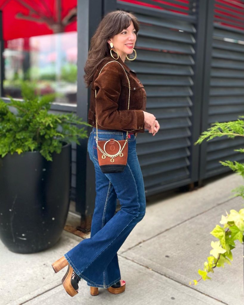 Brown Suede Moto Jacket + Gold Hoop Earrings + Flare Jeans