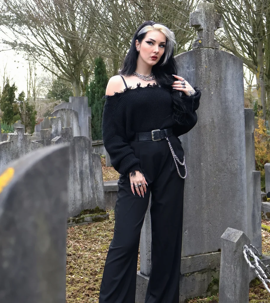 Black Distressed Sweater + Wide-Leg Trousers + Chain Belt