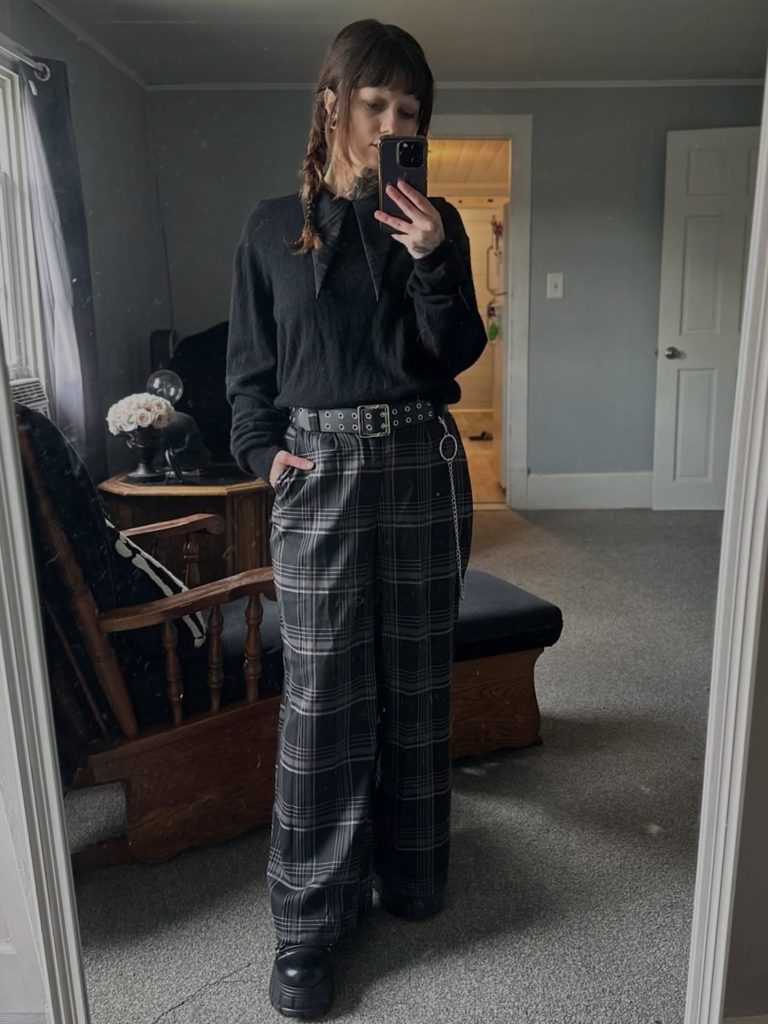 Black Pointed Collar Top + Plaid Wide-Leg Pants + Grommet Belt