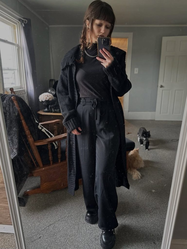 Black Knit Duster + High-Waisted Trousers + Mock Neck Top