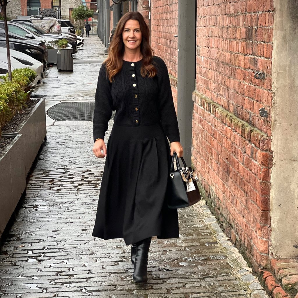 Black Button-Up Cardigan + Pleated Midi Skirt + Leather Knee-High Boots