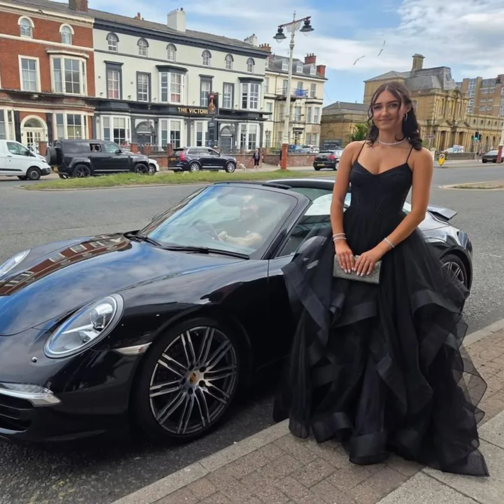 Black Tulle Ballgown + Silver Glitter Clutch + Pearl Necklace