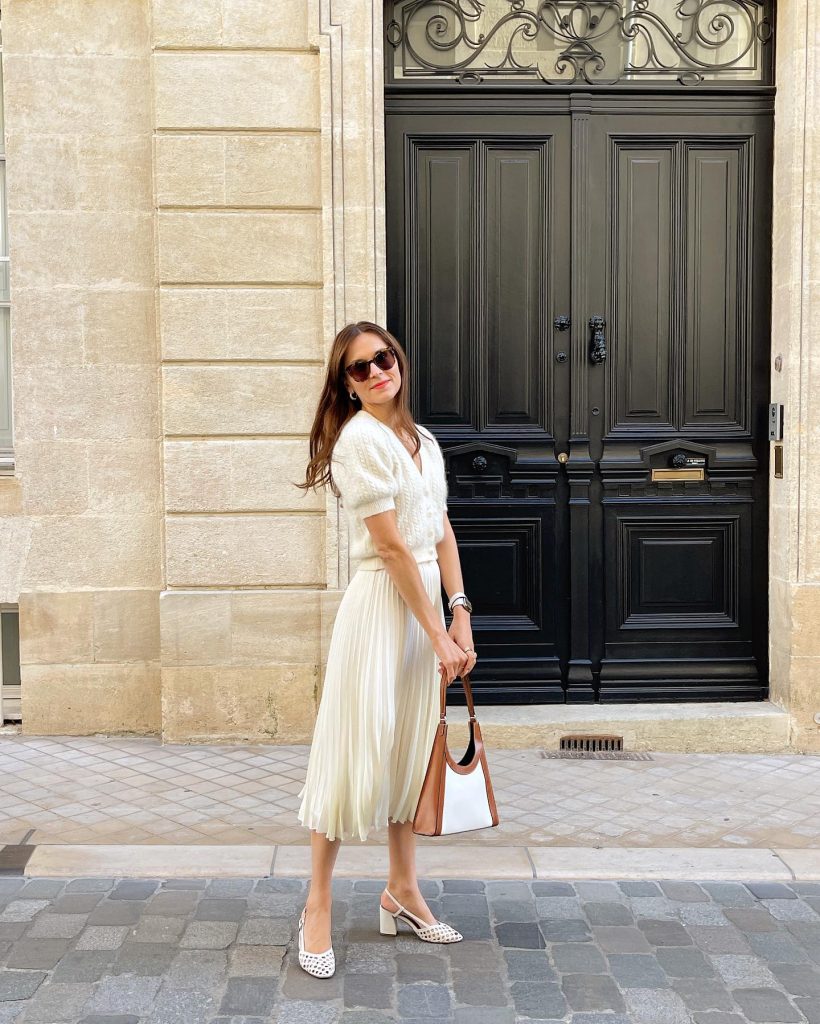 White Short-Sleeve Cardigan + Cream Pleated Midi Skirt + White Slingback Heels