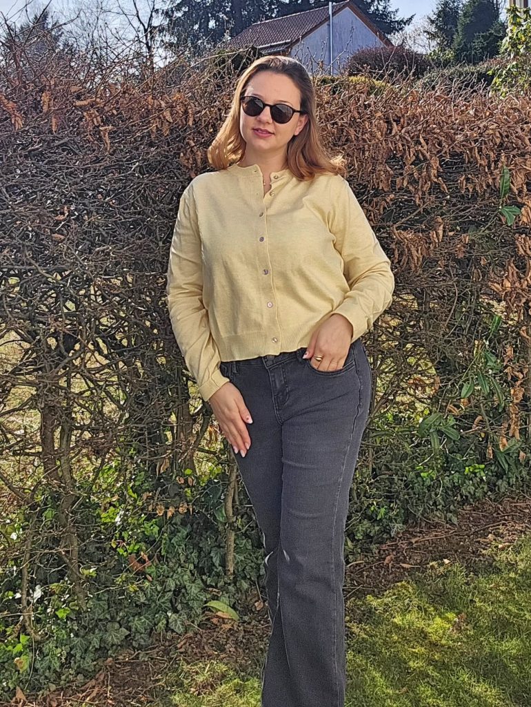  Yellow Cardigan + Dark Grey Flare Jeans + Black Sunglasses