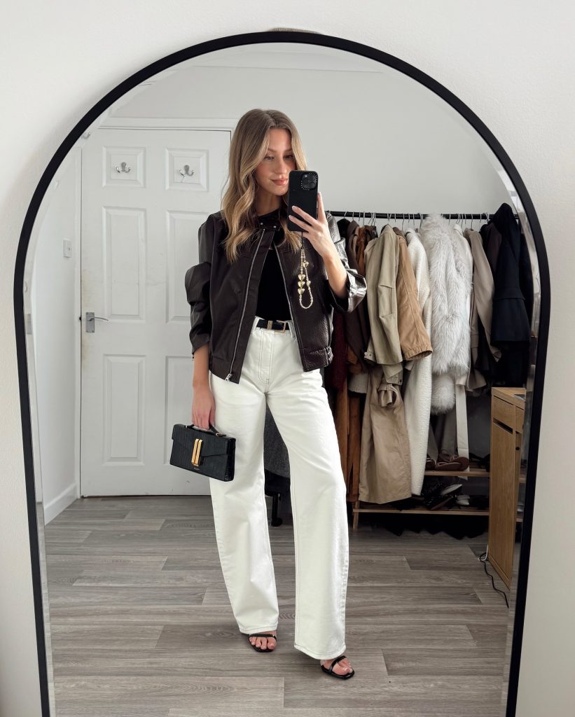 Dark Brown Leather Jacket + White Wide-Leg Jeans + Black Strappy Sandals
