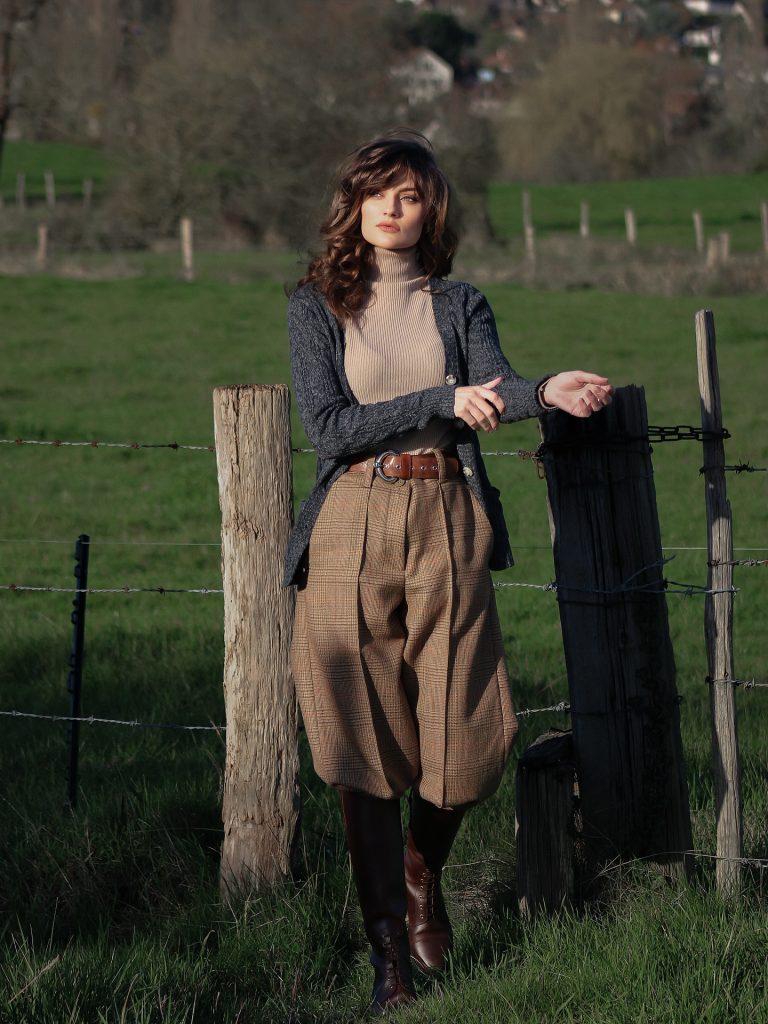 Brown Plaid Jodhpurs + Beige Turtleneck + Navy Cardigan