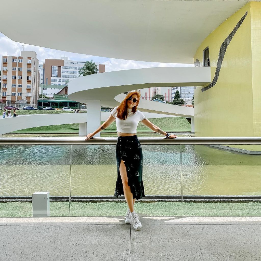 White Crop Top + Black Slit Maxi Skirt + White Sneakers