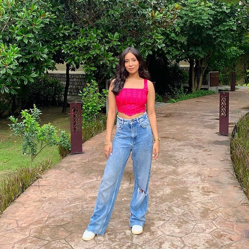 Magenta Corset Crop Top + Distressed Straight-Leg Jeans + White Sneakers