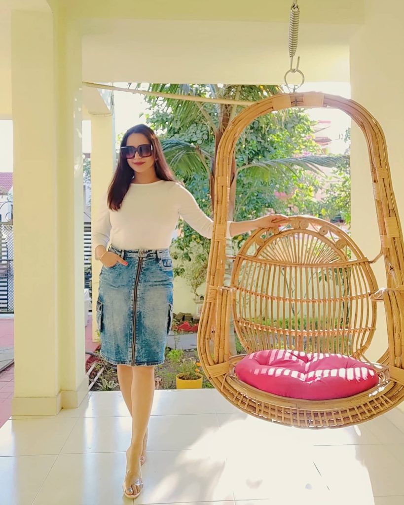 White Long-Sleeve Top + Zippered Denim Skirt + Clear Heels