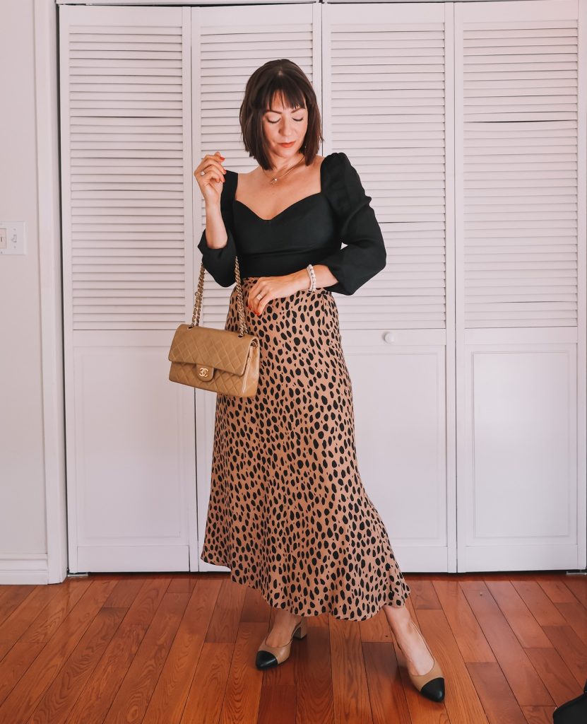 Black Sweetheart Puff-Sleeve Top + Leopard Print Midi Skirt + Tan Quilted Bag