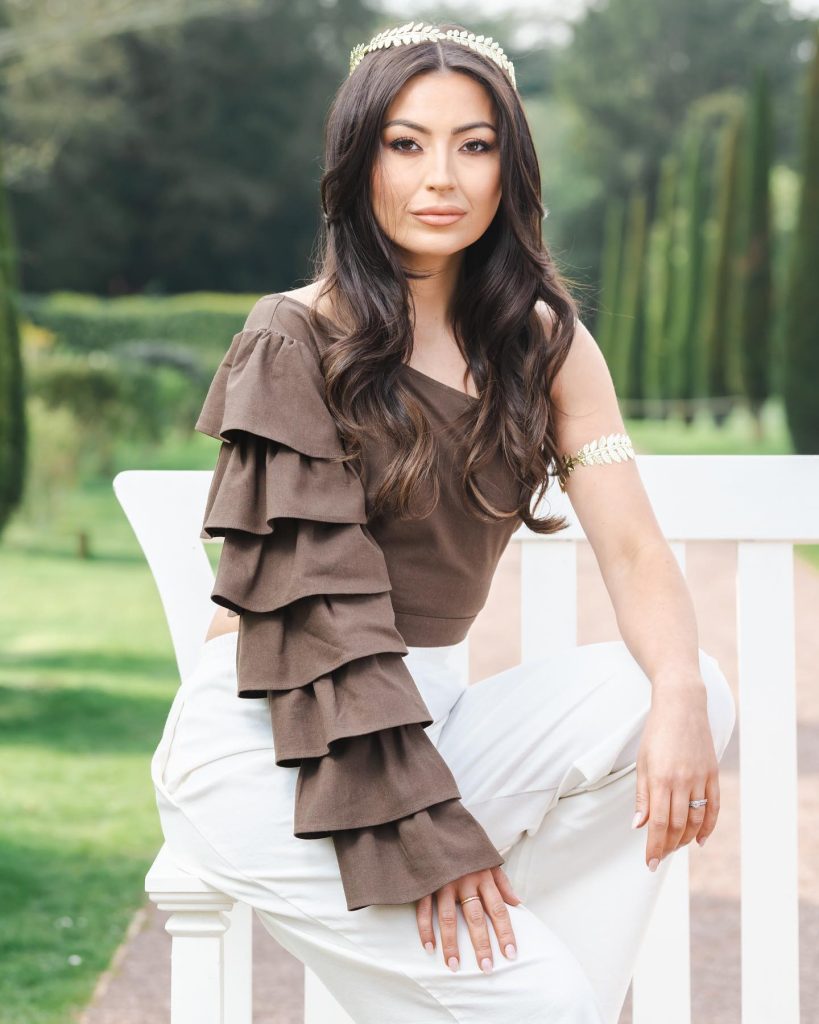 Brown Ruffled Top + White Trousers + Gold Laurel Headband
