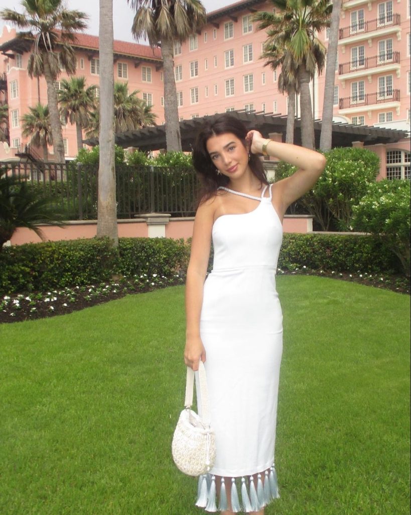 White One-Shoulder Tassel Dress + White Woven Bucket Bag + Gold Watch