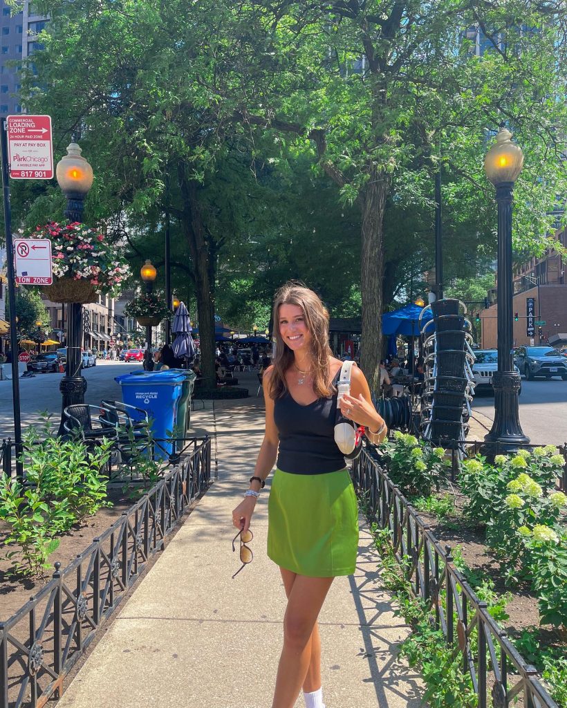 Black Tank Top + Green Mini Skirt + White Shoulder Bag