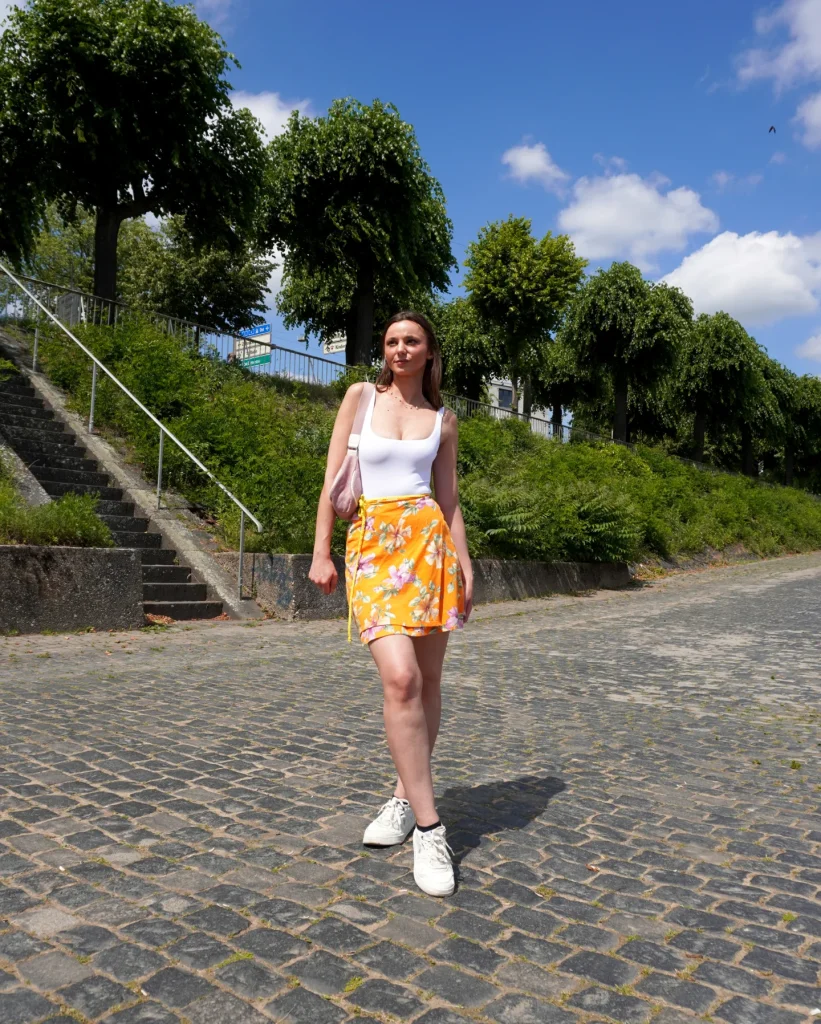 White Bodysuit + Orange Floral Skirt + White Sneakers