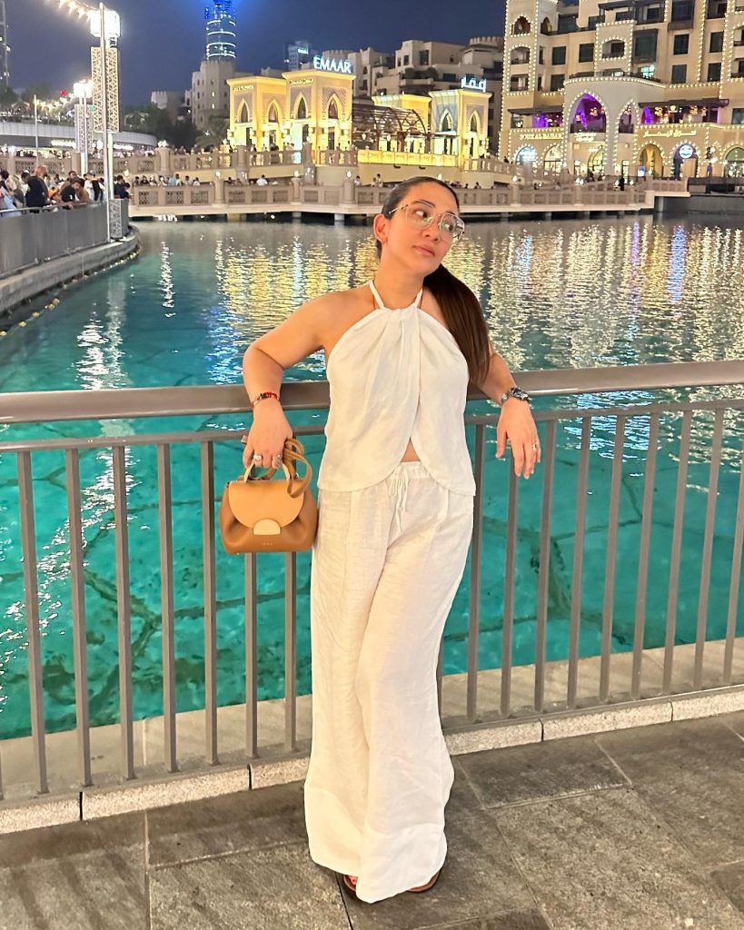 White Halter Top + White Linen Pants + Tan Handbag