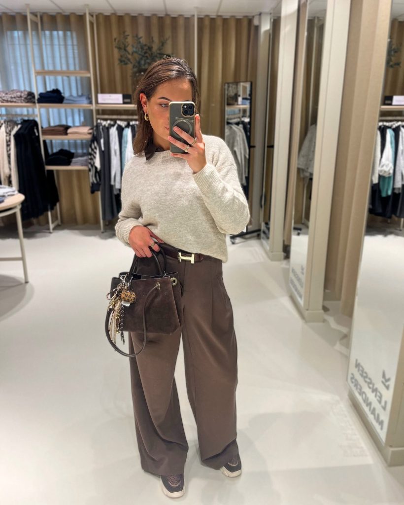 Beige Sweater + Dark Trousers + Suede Bag