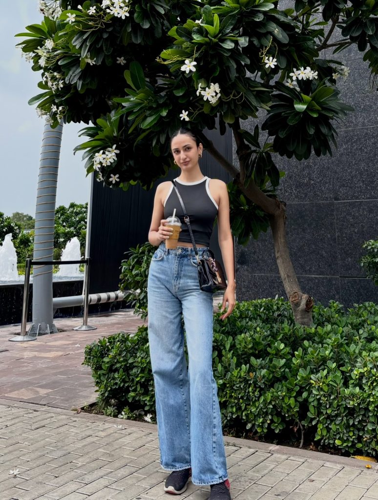 Black Halter Top + Wide-Leg Jeans + Shoulder Bag