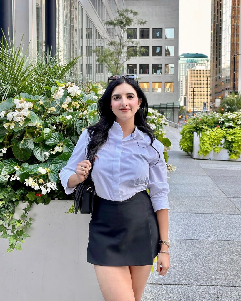 White Button-Down Shirt + Black Mini Skort + Black Shoulder Bag