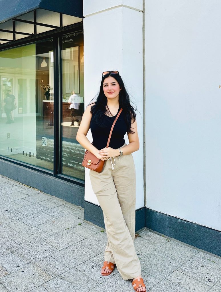 Black Tank Top + Beige Wide-Leg Pants + Tan Slides