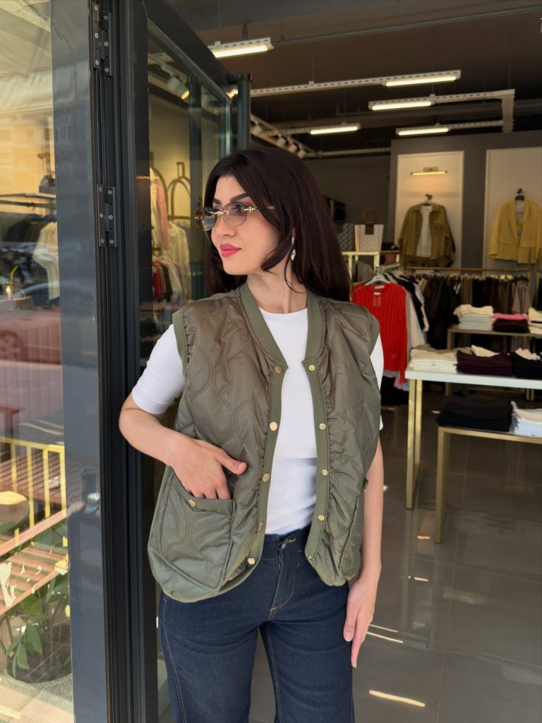 Olive Quilted Vest + White T-shirt + Dark Wash Jeans