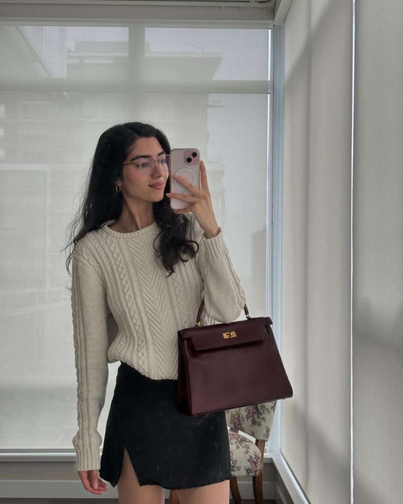 Cream Cable-Knit Sweater + Black Mini Skirt + Burgundy Leather Handbag