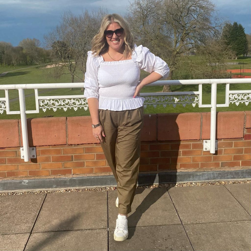 White Puff-Sleeve Blouse + Olive Tapered Trousers + White Sneakers