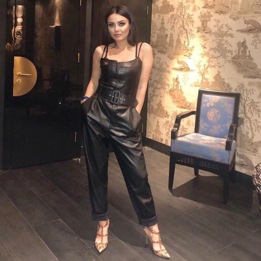 Black Leather Jumpsuit + Studded Belt + Gold Pointed Heels