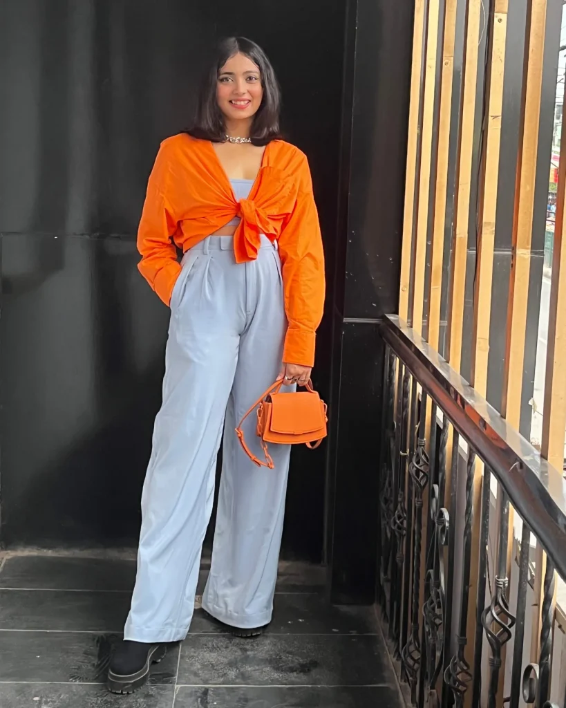Orange Tie-Front Shirt + Ice Blue Wide-Leg Pants + Matching Orange Handbag