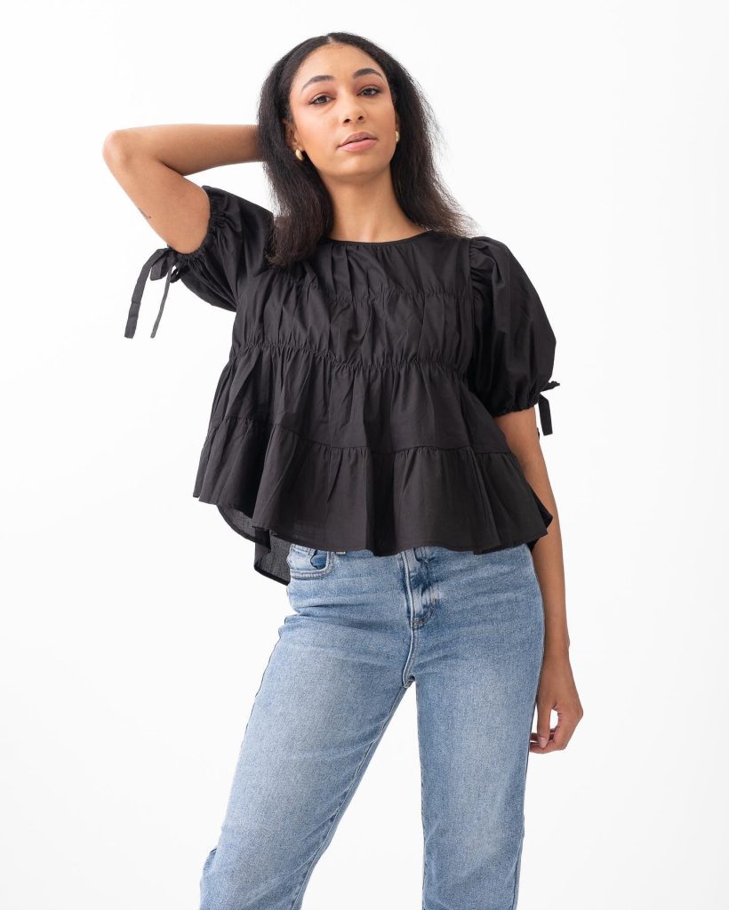 Black Peplum Blouse + Light Wash Jeans