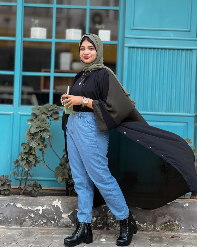 Black Open Abaya + High-Waisted Jeans + Combat Boots